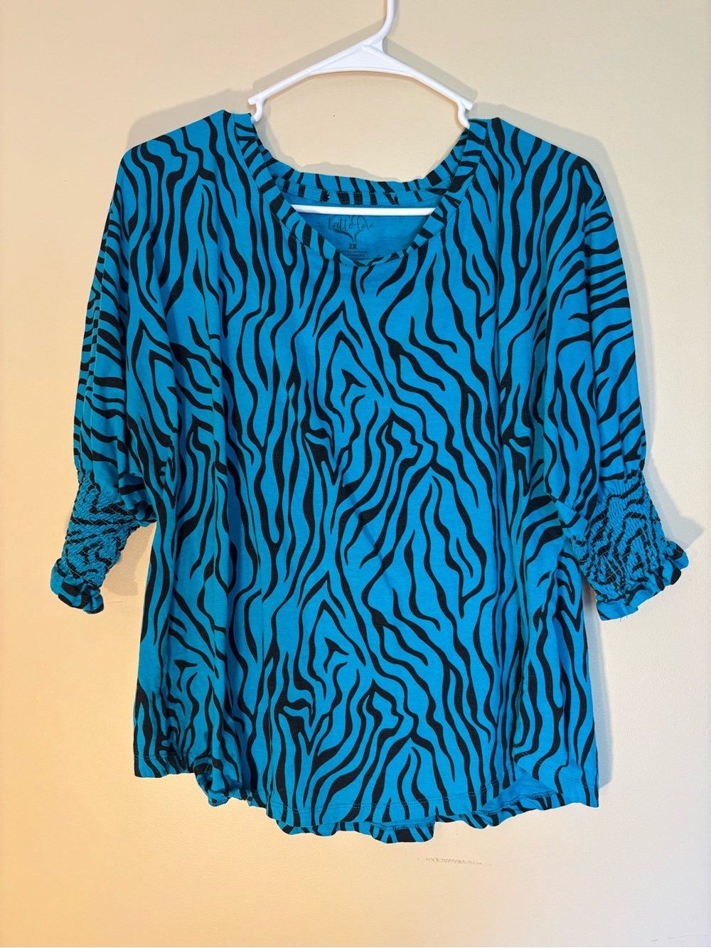 Vivid Blue Zebra-Print Tunic with Smocked Cuffs